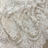 Ivory Abloom Corded Lace — featuring scalloped edges, floral motifs and a corded texture, in nylon and viscose, 130cm wide