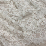 Ivory 3D Floral Lace — featuring scalloped edges, floral motifs and a 3D floral design, in nylon and viscose, 130cm wide