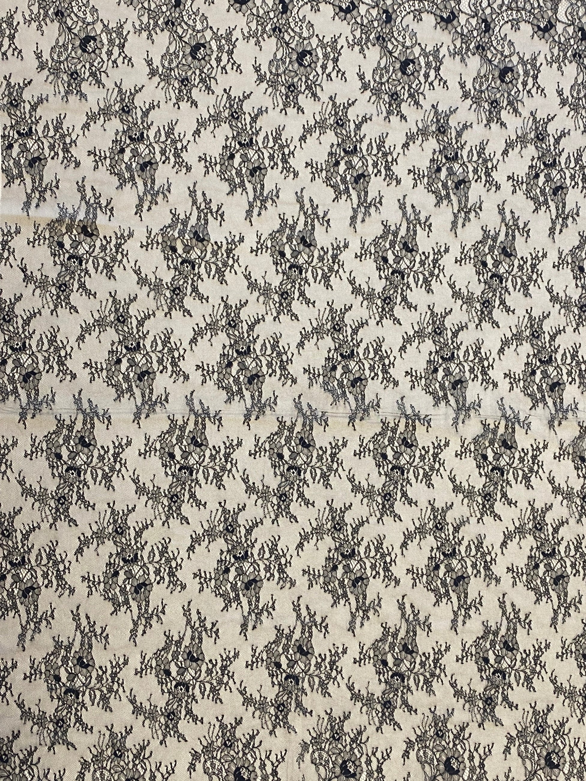 Black Fine Floral Lace — featuring scalloped edges, eyelash detail and floral motifs, 150cm wide