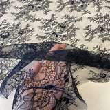 Black Fine Floral Lace — featuring scalloped edges, eyelash detail and floral motifs, 150cm wide
