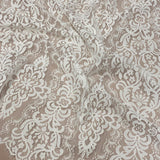 Light Ivory Corded Fine Lace — featuring scalloped edges, eyelash detail, arabesque motifs and a corded texture, 130cm wide