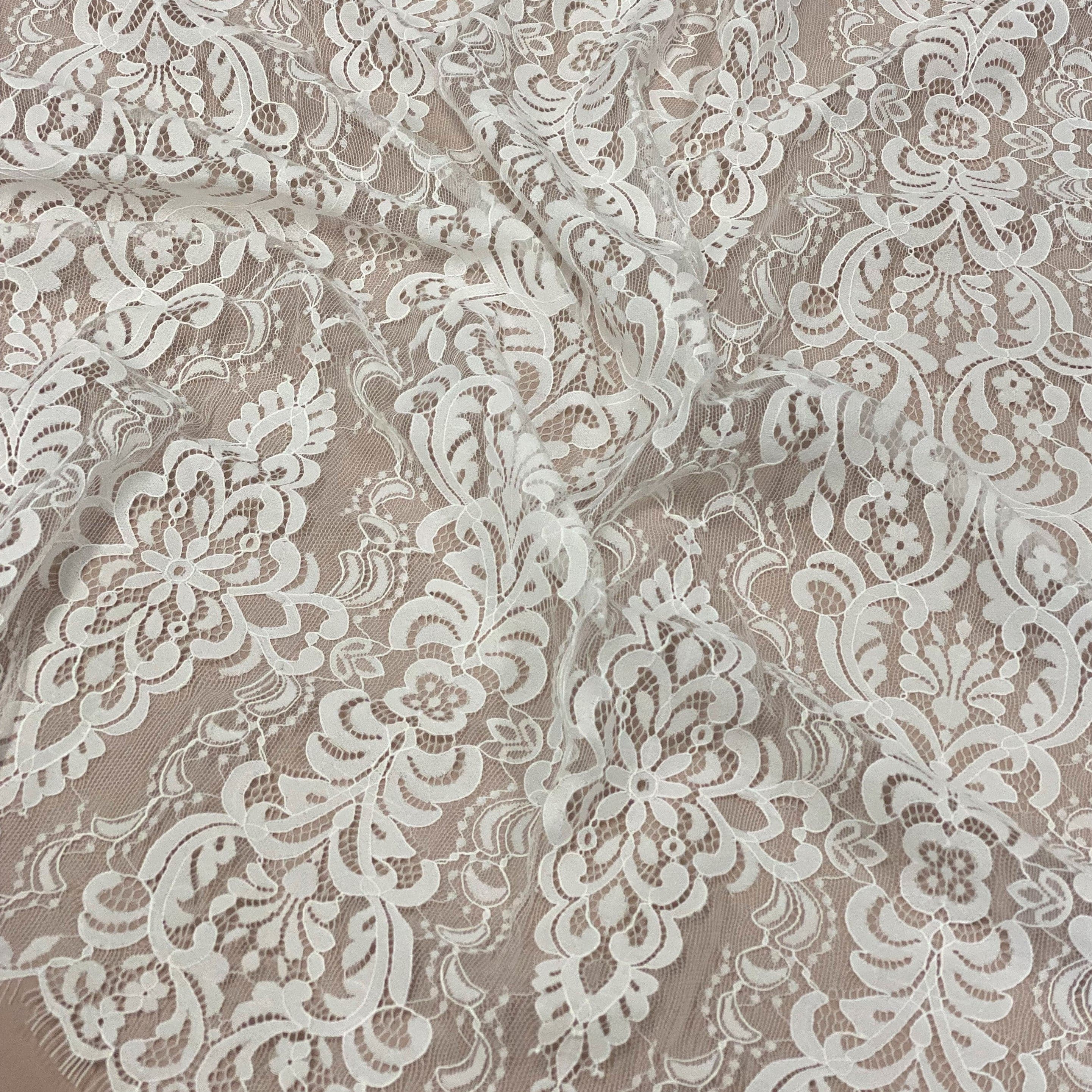 Light Ivory Corded Fine Lace — featuring scalloped edges, eyelash detail, arabesque motifs and a corded texture, 130cm wide
