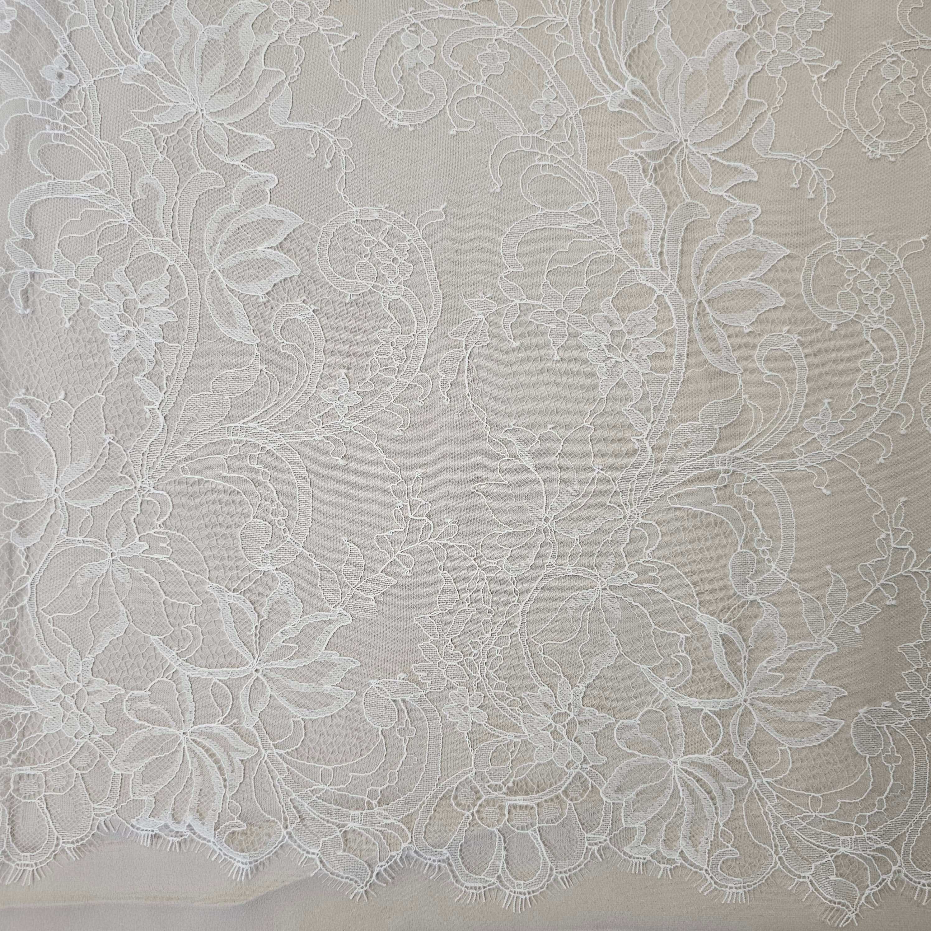 Ivory Fine Floral Lace — featuring scalloped edges, eyelash detail and floral motifs, in nylon, 130cm wide