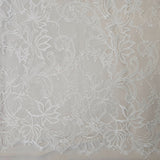 Ivory Fine Floral Lace — featuring scalloped edges, eyelash detail and floral motifs, in nylon, 130cm wide