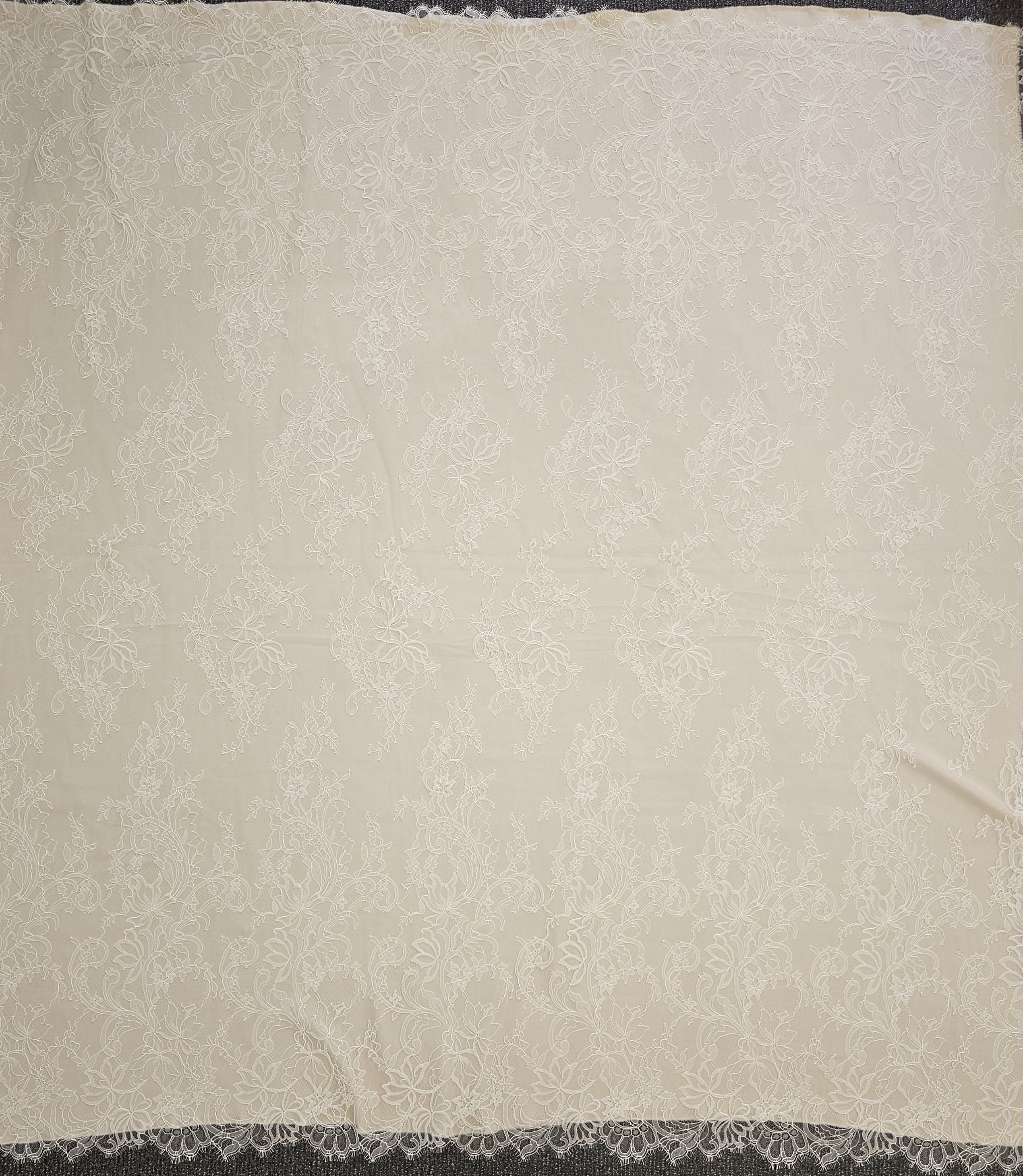 Ivory Fine Floral Lace — featuring scalloped edges, eyelash detail and floral motifs, in nylon, 130cm wide