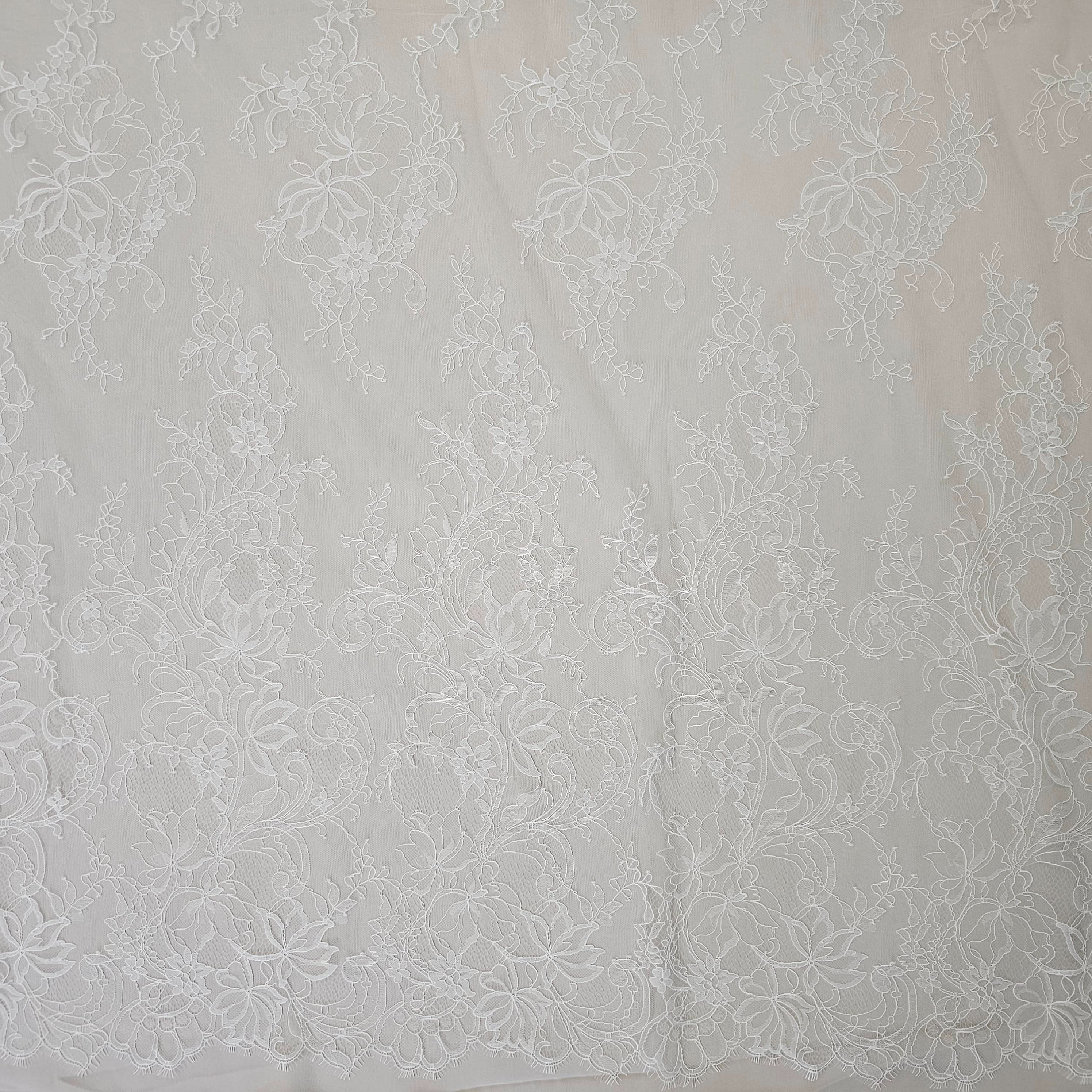 Ivory Fine Floral Lace — featuring scalloped edges, eyelash detail and floral motifs, in nylon, 130cm wide