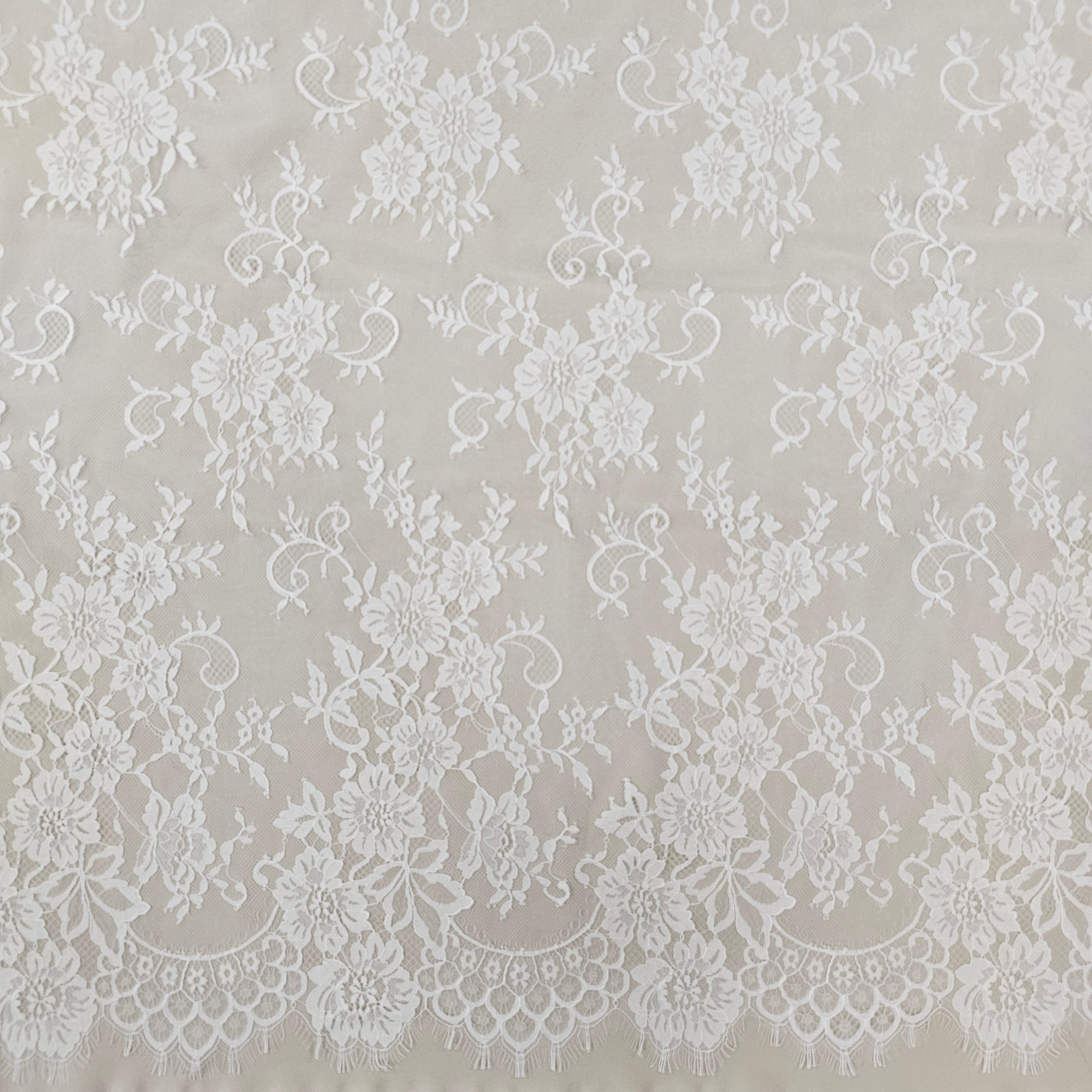 Ivory Fine Floral Lace — featuring scalloped edges and floral motifs, 130cm wide
