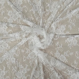 Ivory Fine Floral Lace — featuring scalloped edges and floral motifs, 130cm wide