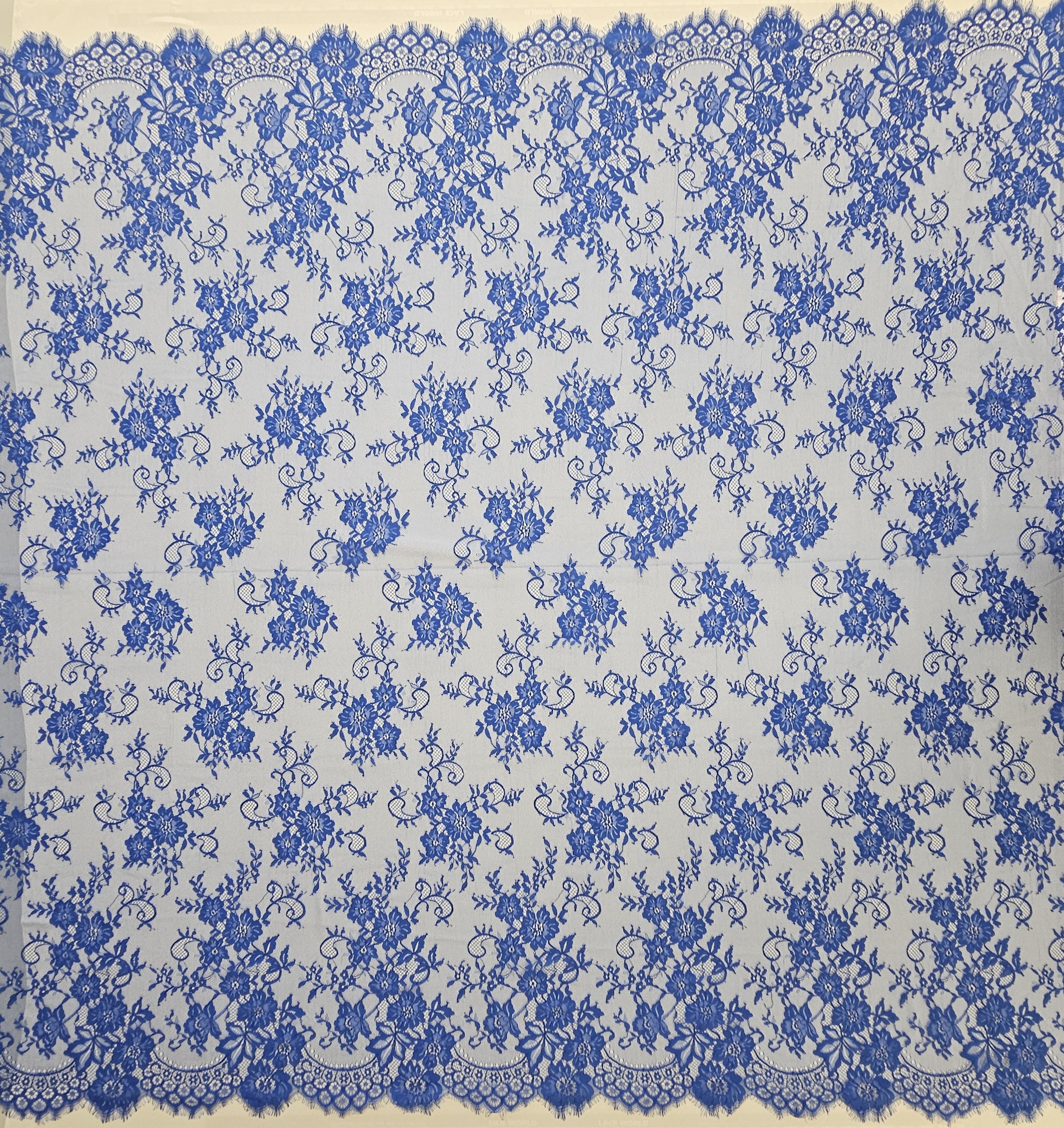 Marine Fine Floral Lace — featuring scalloped edges and floral motifs, 130cm wide