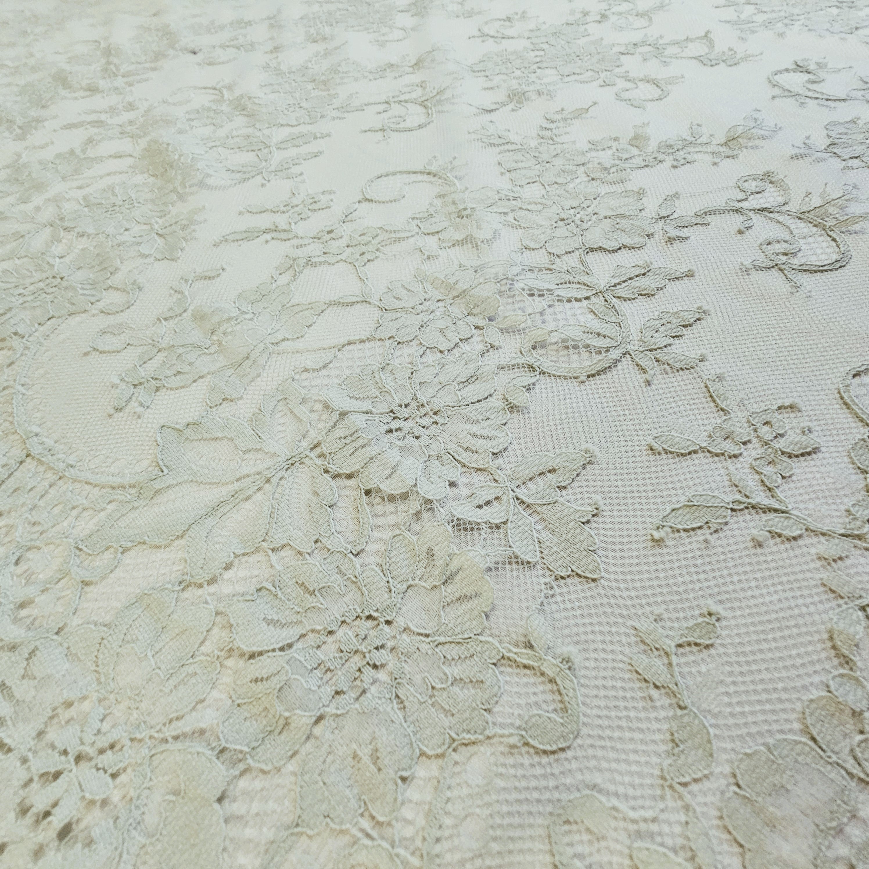 Mint Fine Floral Lace — featuring scalloped edges and floral motifs, 130cm wide