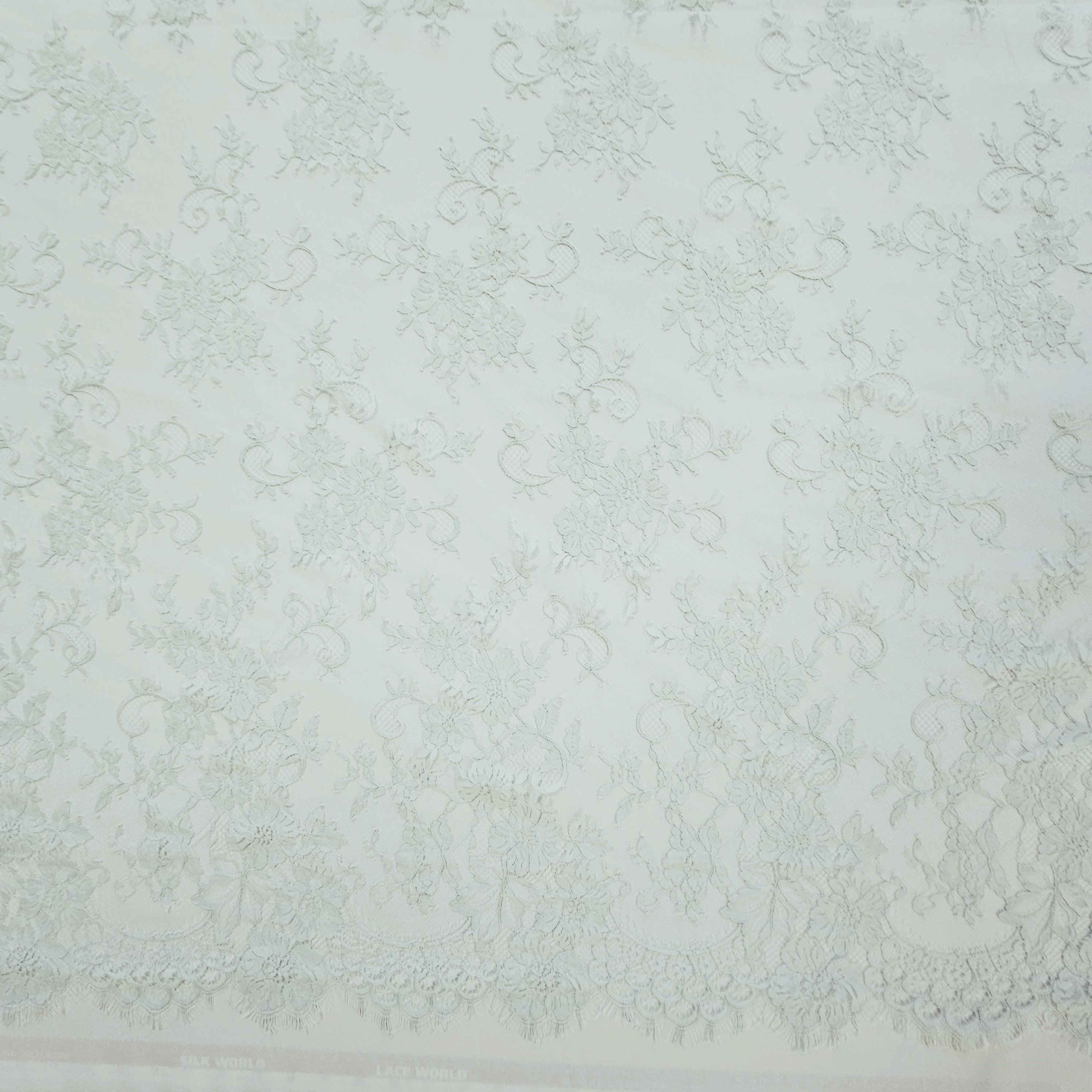 Mint Fine Floral Lace — featuring scalloped edges and floral motifs, 130cm wide