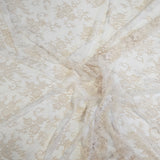 Nude Fine Floral Lace — featuring scalloped edges and floral motifs, 130cm wide