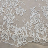 Ivory Fine Floral Lace — featuring scalloped edges, eyelash detail and floral motifs, in nylon, 130cm wide
