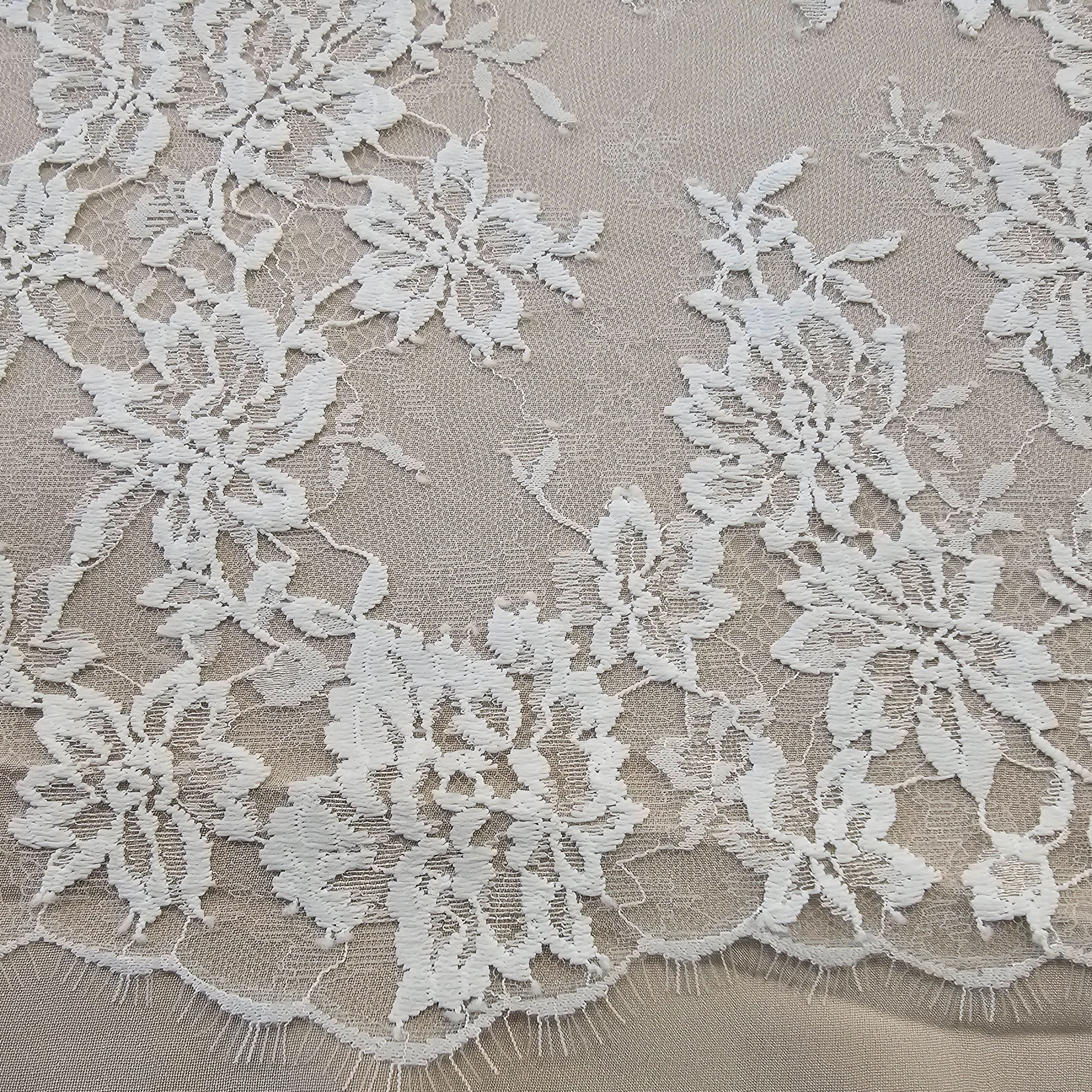 Ivory Fine Floral Lace — featuring scalloped edges, eyelash detail and floral motifs, in nylon, 130cm wide