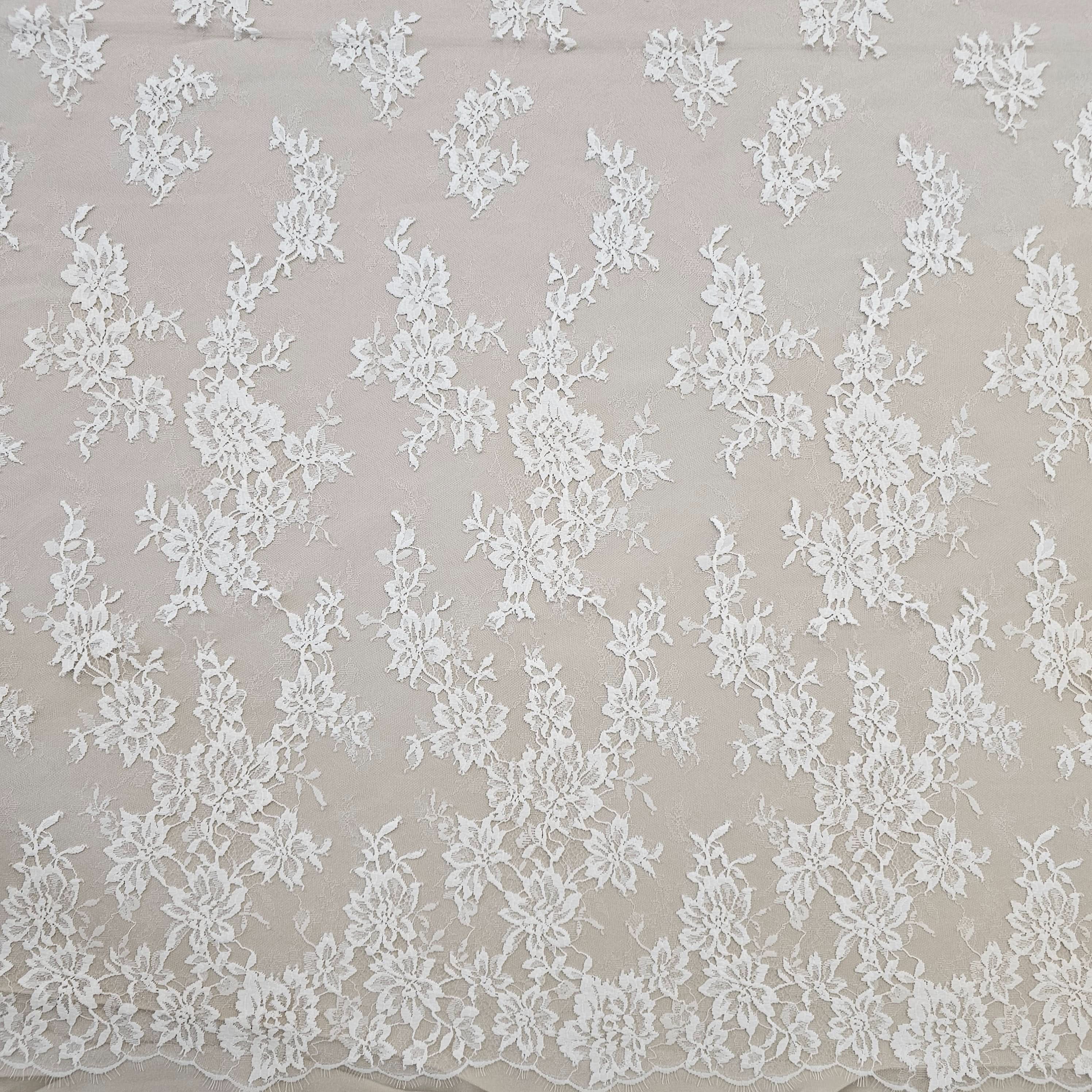 Ivory Fine Floral Lace — featuring scalloped edges, eyelash detail and floral motifs, in nylon, 130cm wide