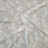 Ivory Fine Floral Lace — featuring scalloped edges, eyelash detail and floral motifs, in nylon, 130cm wide