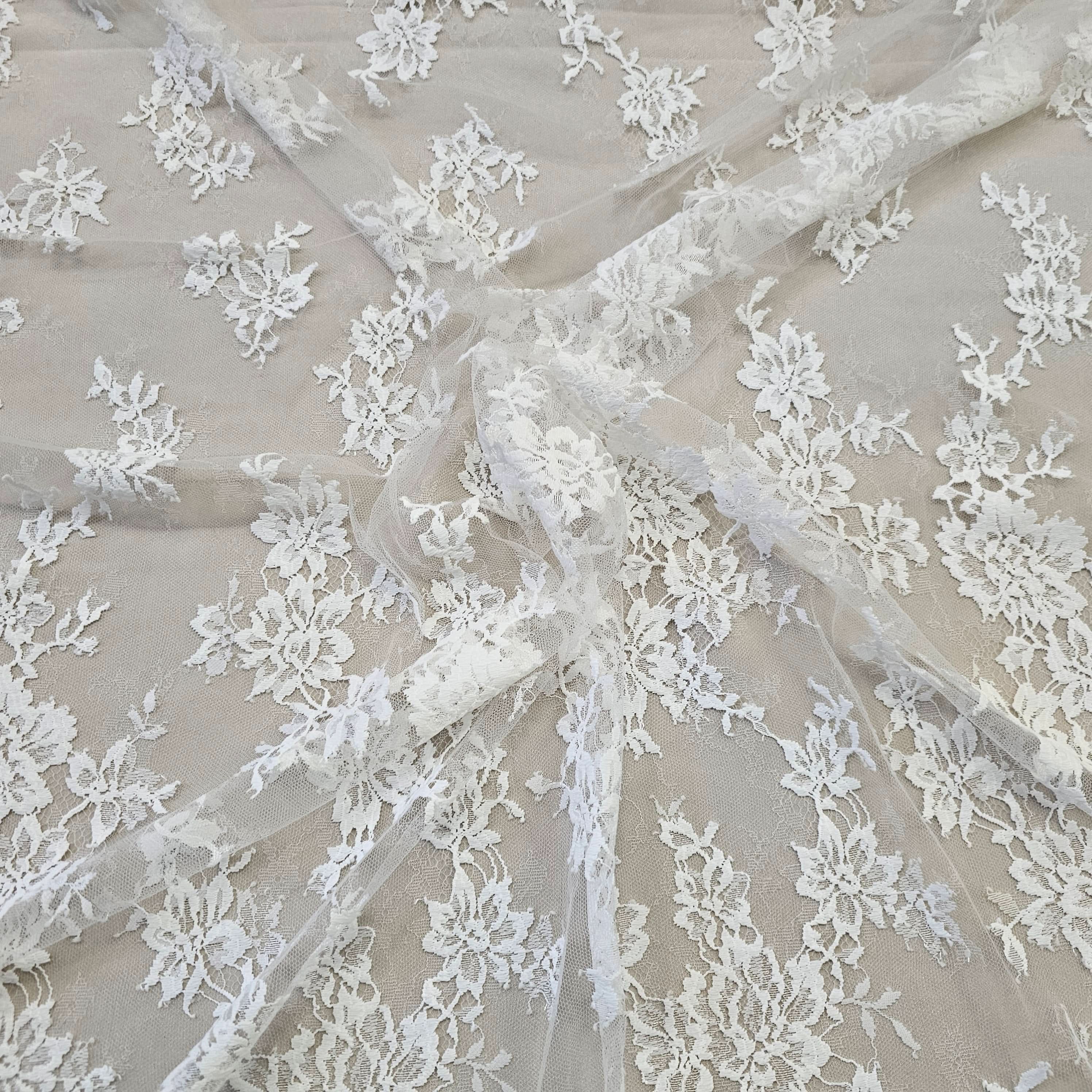 Ivory Fine Floral Lace — featuring scalloped edges, eyelash detail and floral motifs, in nylon, 130cm wide