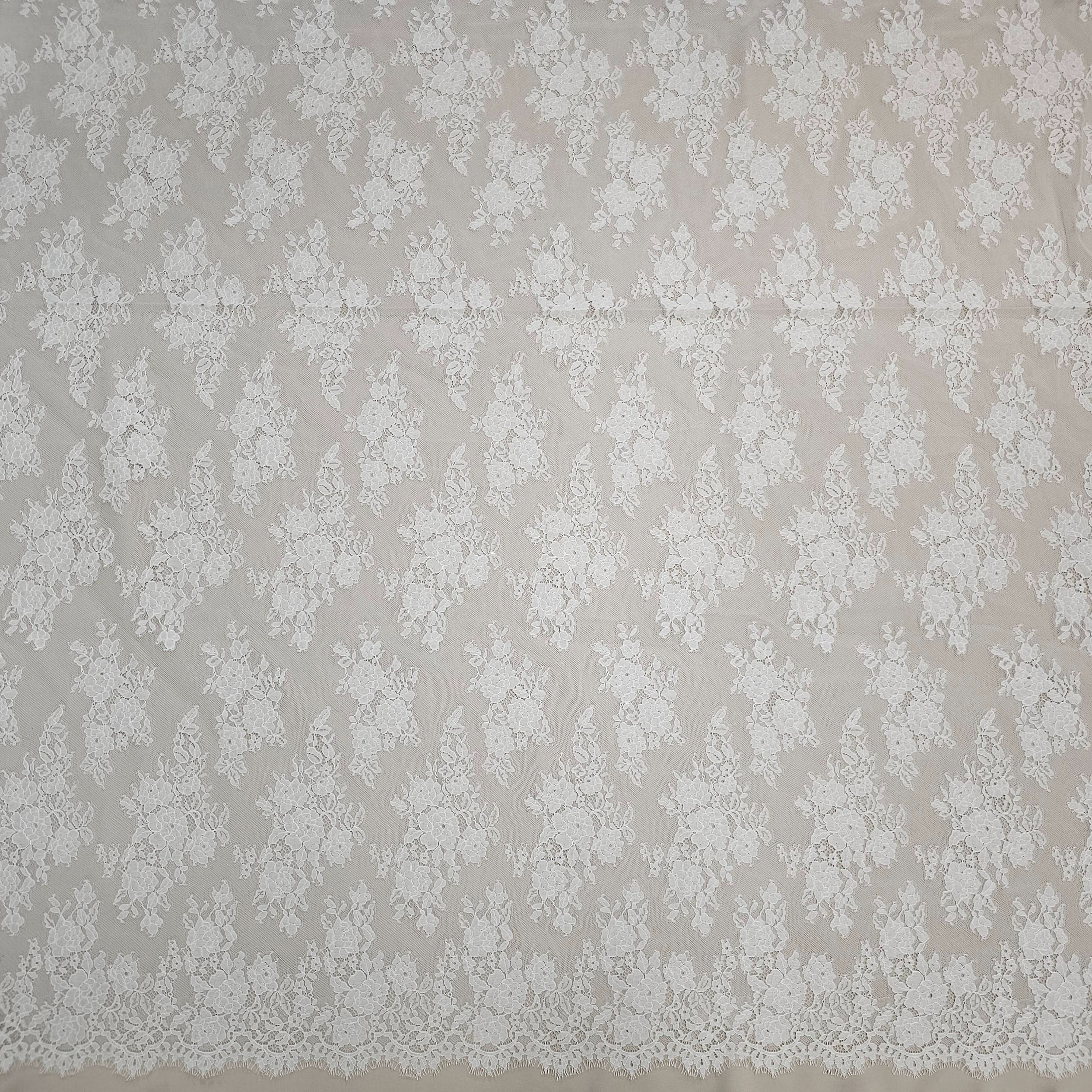 Ivory Fine Floral Lace — featuring scalloped edges, eyelash detail and floral motifs, in nylon and cotton, 150cm wide