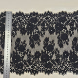 Black Fine Lace Trim — featuring scalloped edges, eyelash detail and floral motifs, in cotton and nylon, 30cm wide