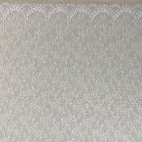 Ivory Floral Lace — featuring scalloped edges, eyelash detail and floral motifs, in nylon, 150cm wide