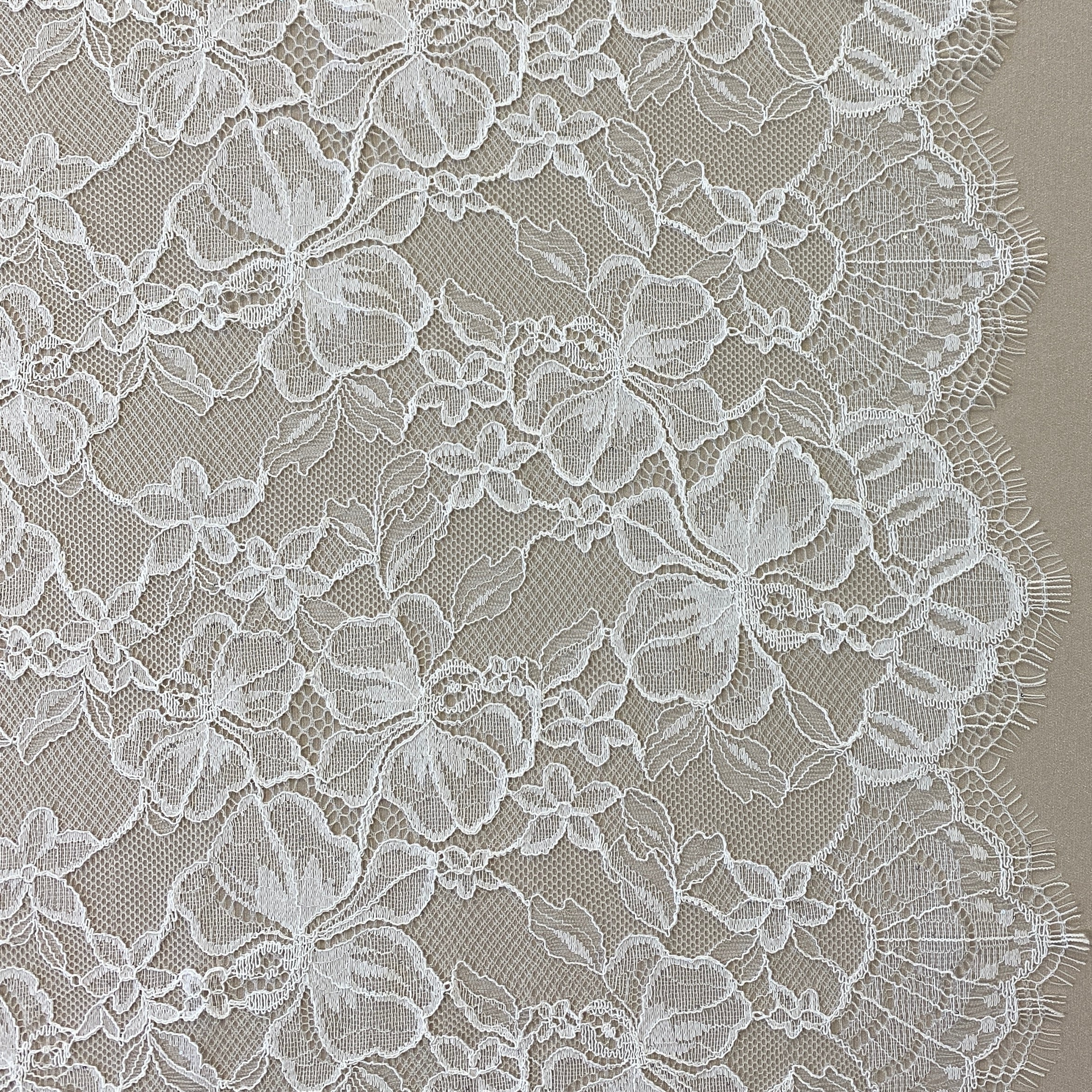 Ivory Glitter Floral Lace — featuring scalloped edges and floral motifs, in nylon, 140cm wide