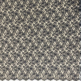 Black Glitter Floral Lace — featuring scalloped edges and floral motifs, in nylon, 160cm wide