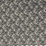 Black Glitter Floral Lace — featuring scalloped edges and floral motifs, in nylon, 160cm wide