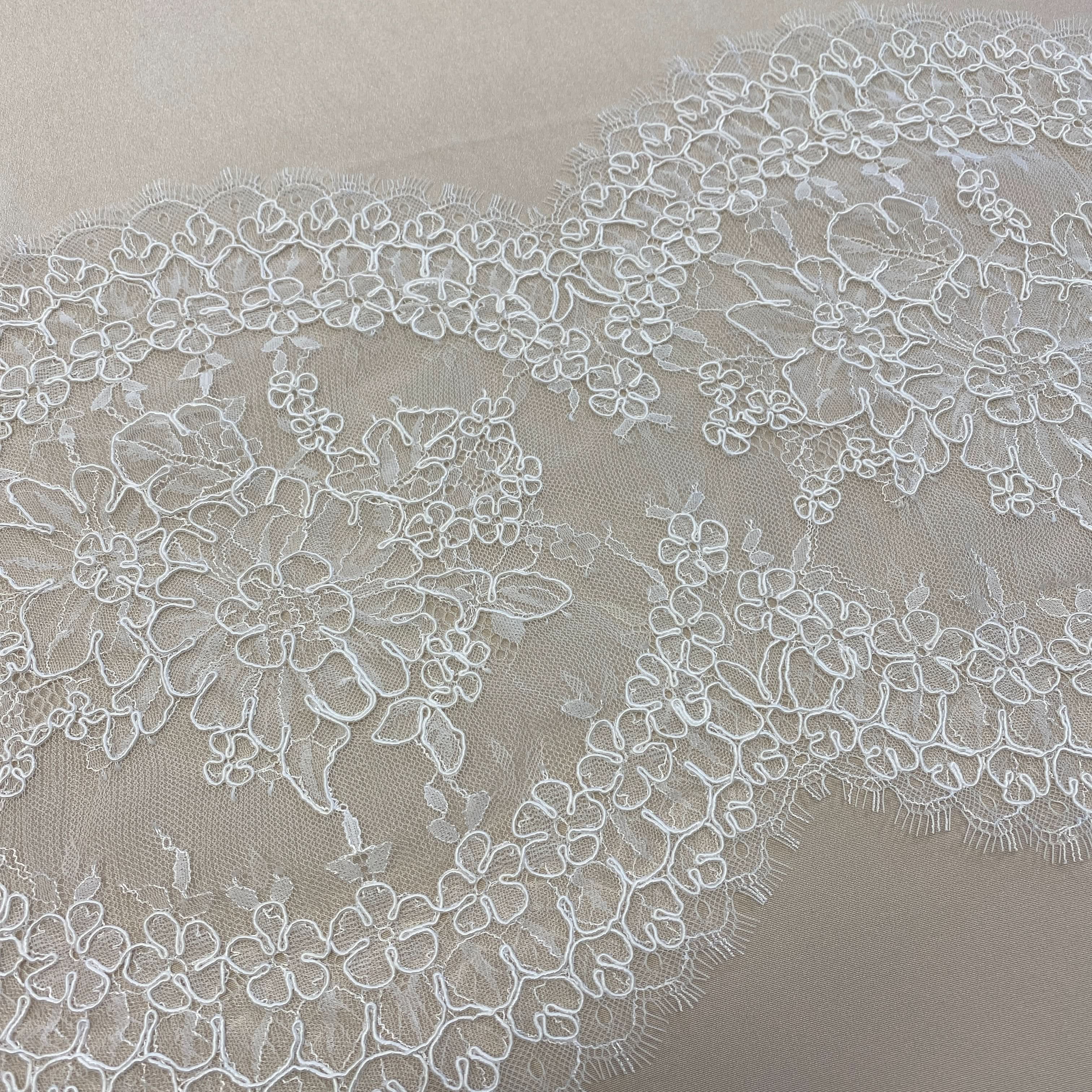 Ivory Fine Corded Lace Trim — featuring floral motifs and a corded texture, in nylon, viscose and cotton, 30cm wide