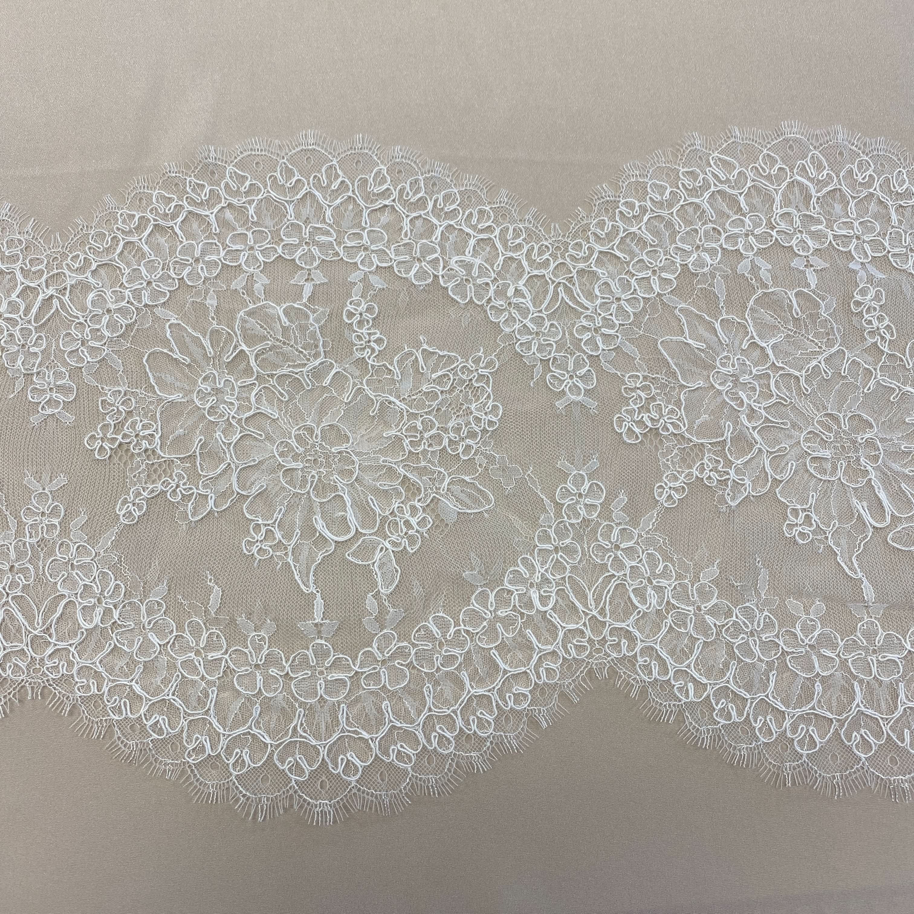 Ivory Fine Corded Lace Trim — featuring floral motifs and a corded texture, in nylon, viscose and cotton, 30cm wide