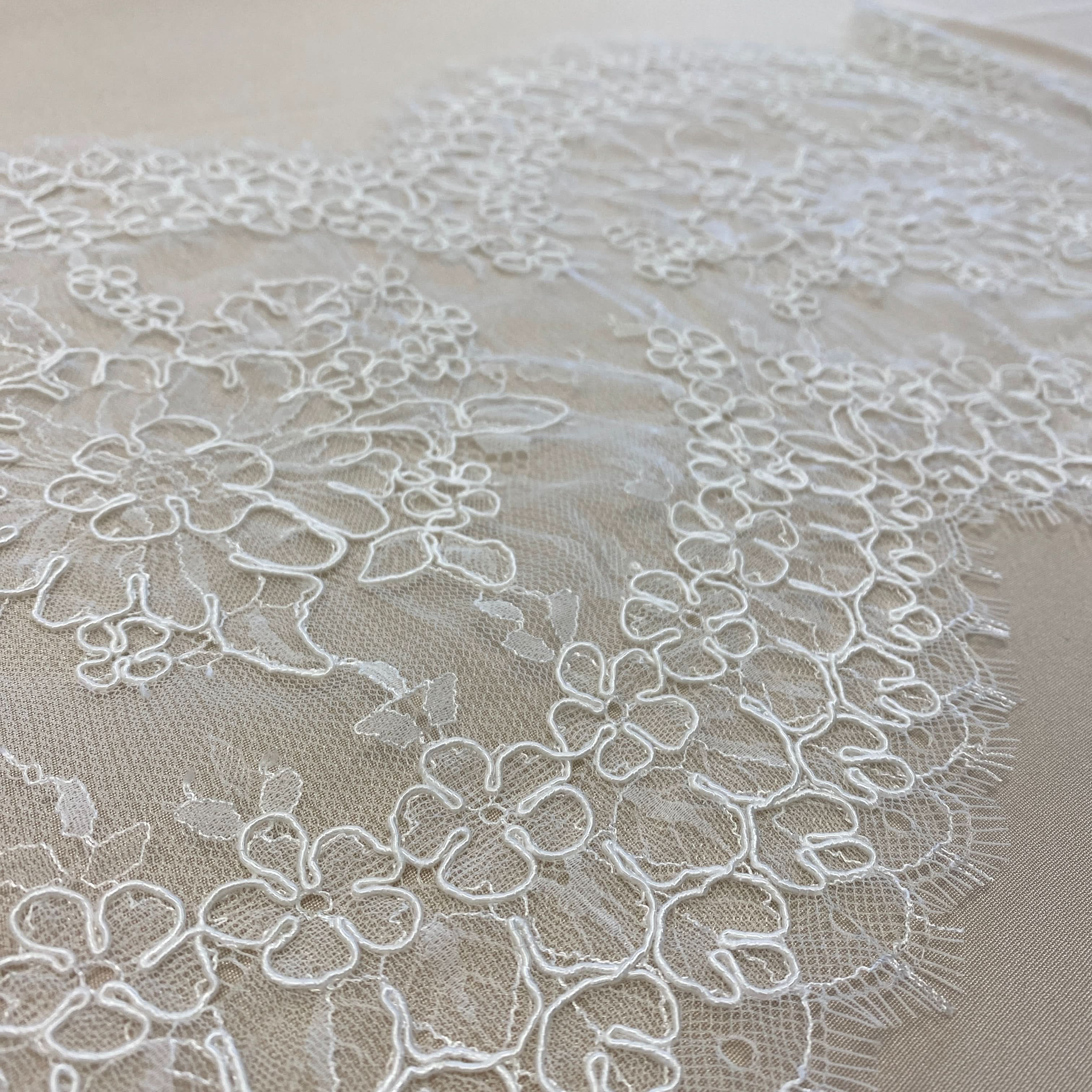 Ivory Fine Corded Lace Trim — featuring floral motifs and a corded texture, in nylon, viscose and cotton, 30cm wide