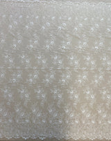 Ivory Fine Lace — featuring scalloped edges and floral motifs, 140cm wide