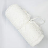 Ivory Fine Rosette Lace — featuring rosette motifs and scrolling swirls, in nylon, 145cm wide