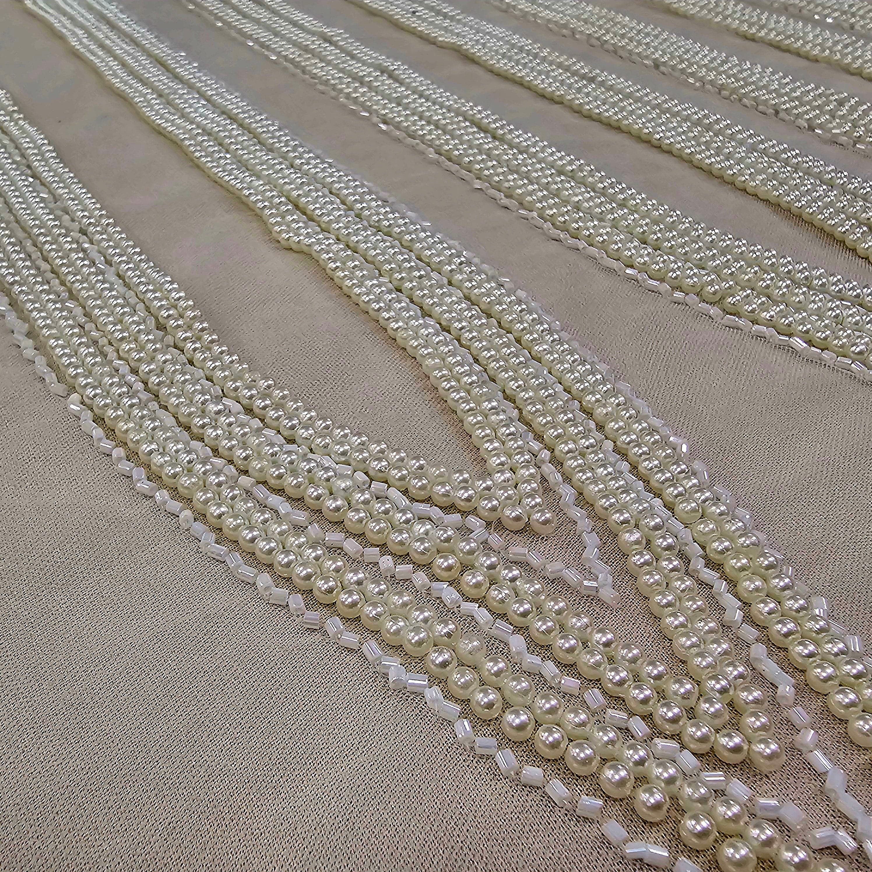 Ivory Beaded Tulle — featuring hand-beading, 100% polyamide, 140cm wide