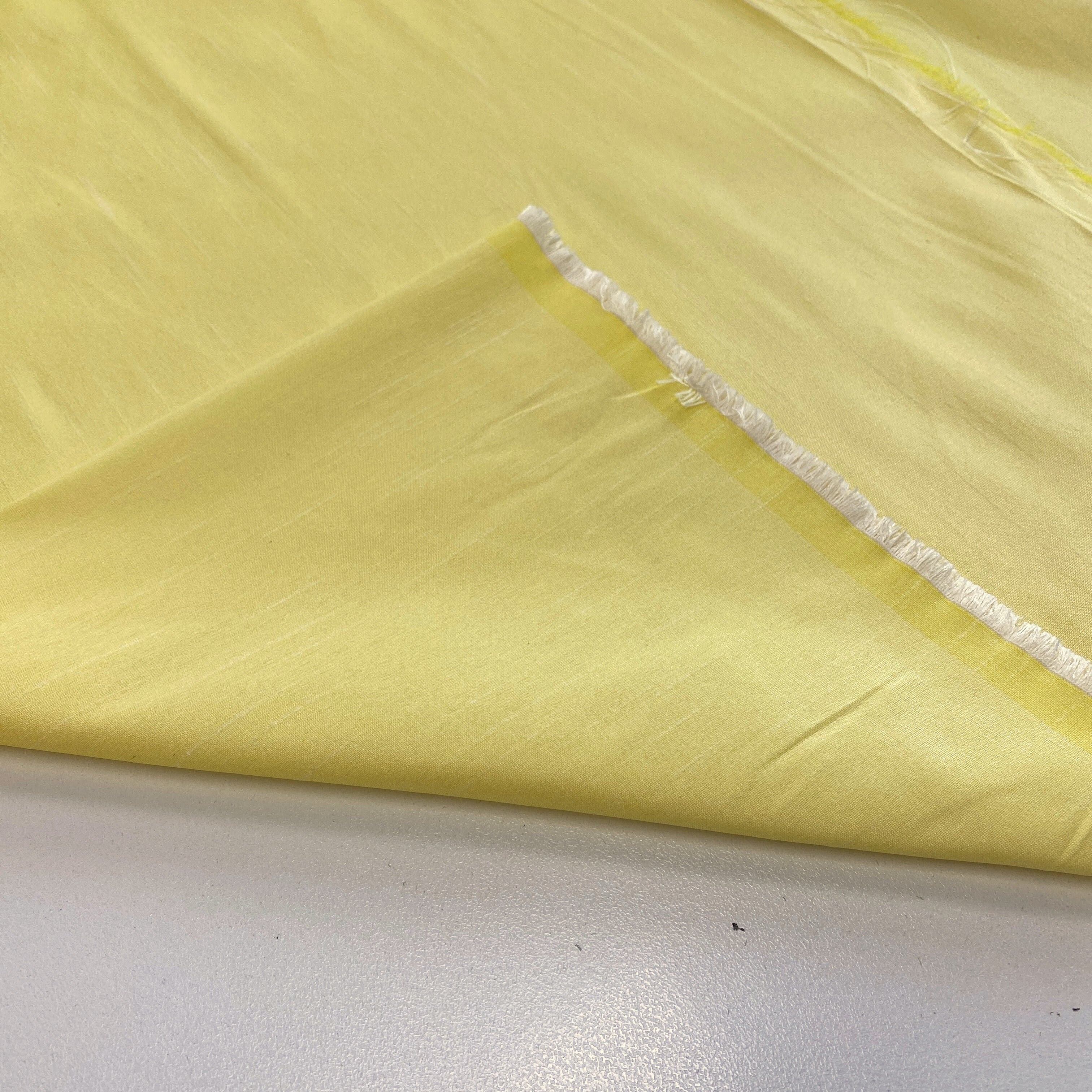 Pastel Yellow Polyester Dupion — mid-weight and crisp with a lightly slubbed texture, 100% polyester, 140cm wide