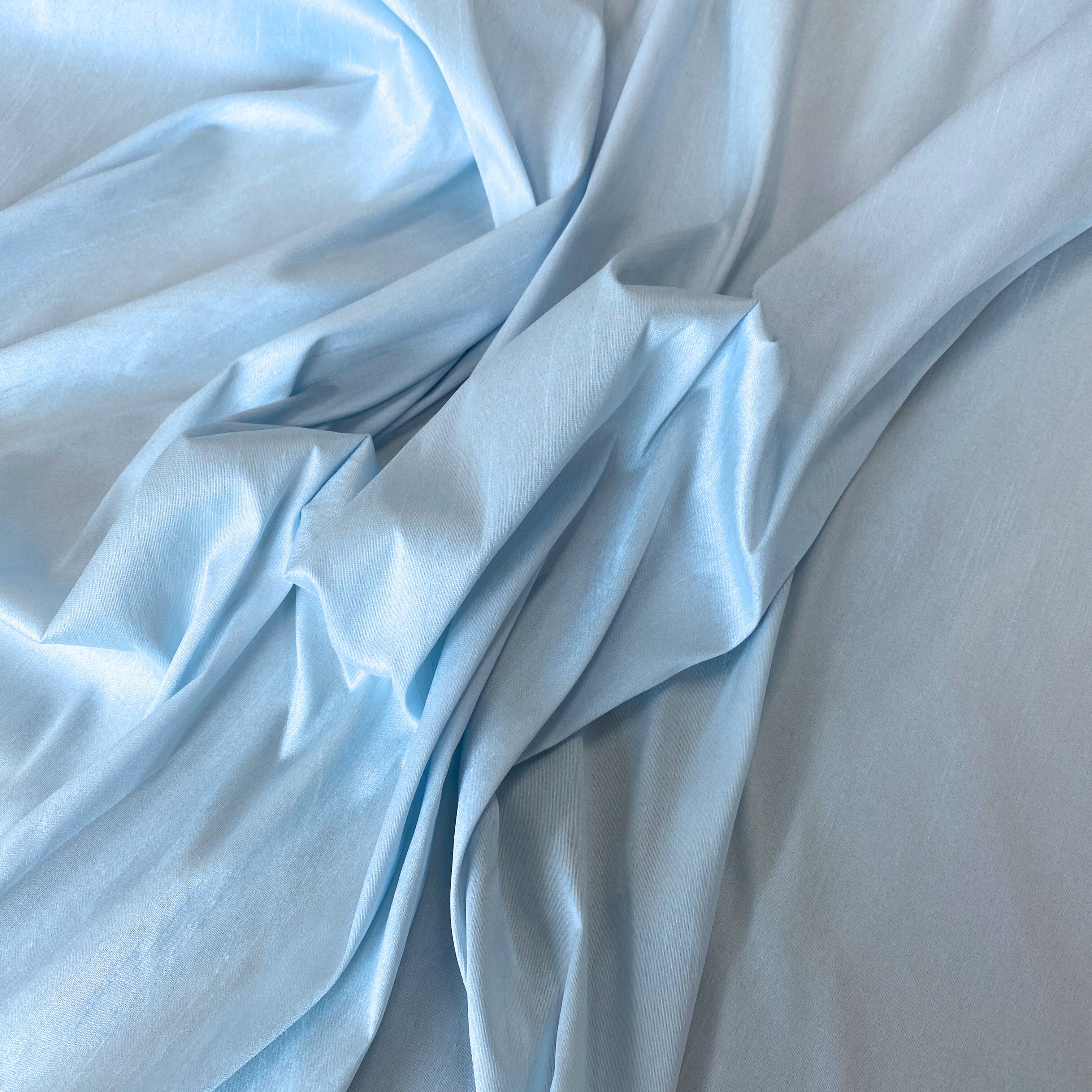 Baby Blue Polyester Dupion — mid-weight and crisp with a lightly slubbed texture, 100% polyester, 140cm wide