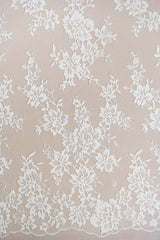Ivory Fine Floral Lace — featuring scalloped edges, eyelash detail and floral motifs, in nylon, 130cm wide