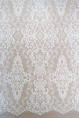 Light Ivory Corded Fine Lace — featuring scalloped edges, eyelash detail, arabesque motifs and a corded texture, 130cm wide
