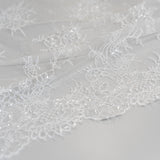 Ivory Beaded Lace — featuring scalloped edges, floral motifs and hand-beading, in nylon and viscose, 130cm wide