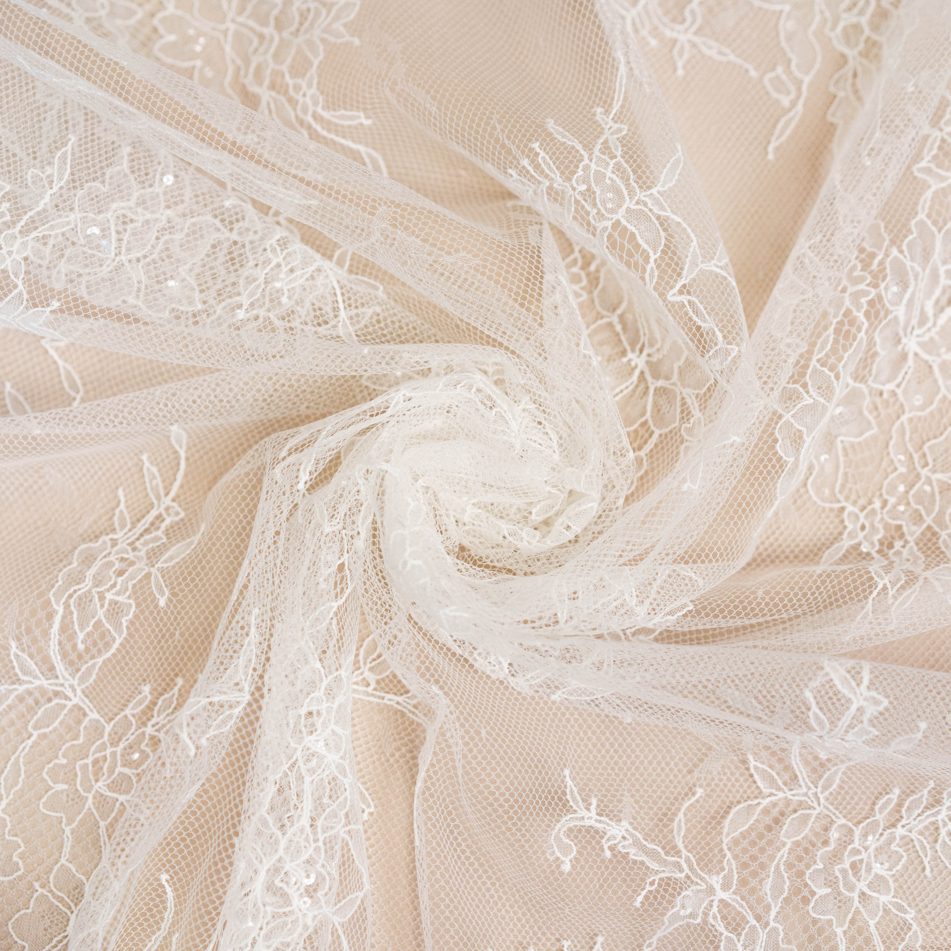 Ivory Beaded Lace — featuring scalloped edges, floral motifs and hand-beading, in nylon and viscose, 130cm wide