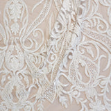 Ivory Beaded Tulle — featuring hand-beading, 100% nylon, 130cm wide