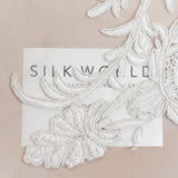 Ivory Beaded Tulle — featuring hand-beading, 100% nylon, 130cm wide