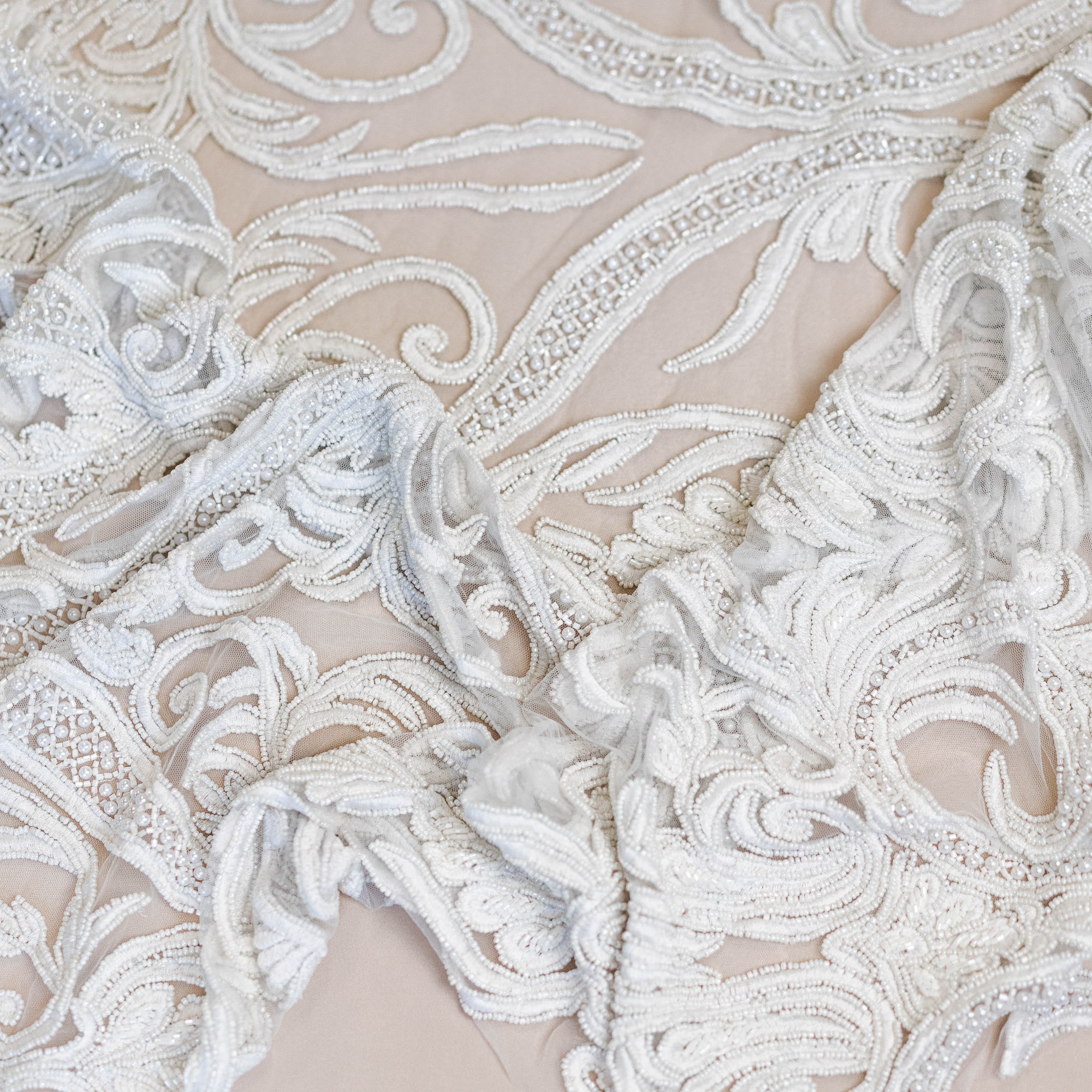 Ivory Beaded Tulle — featuring hand-beading, 100% nylon, 130cm wide