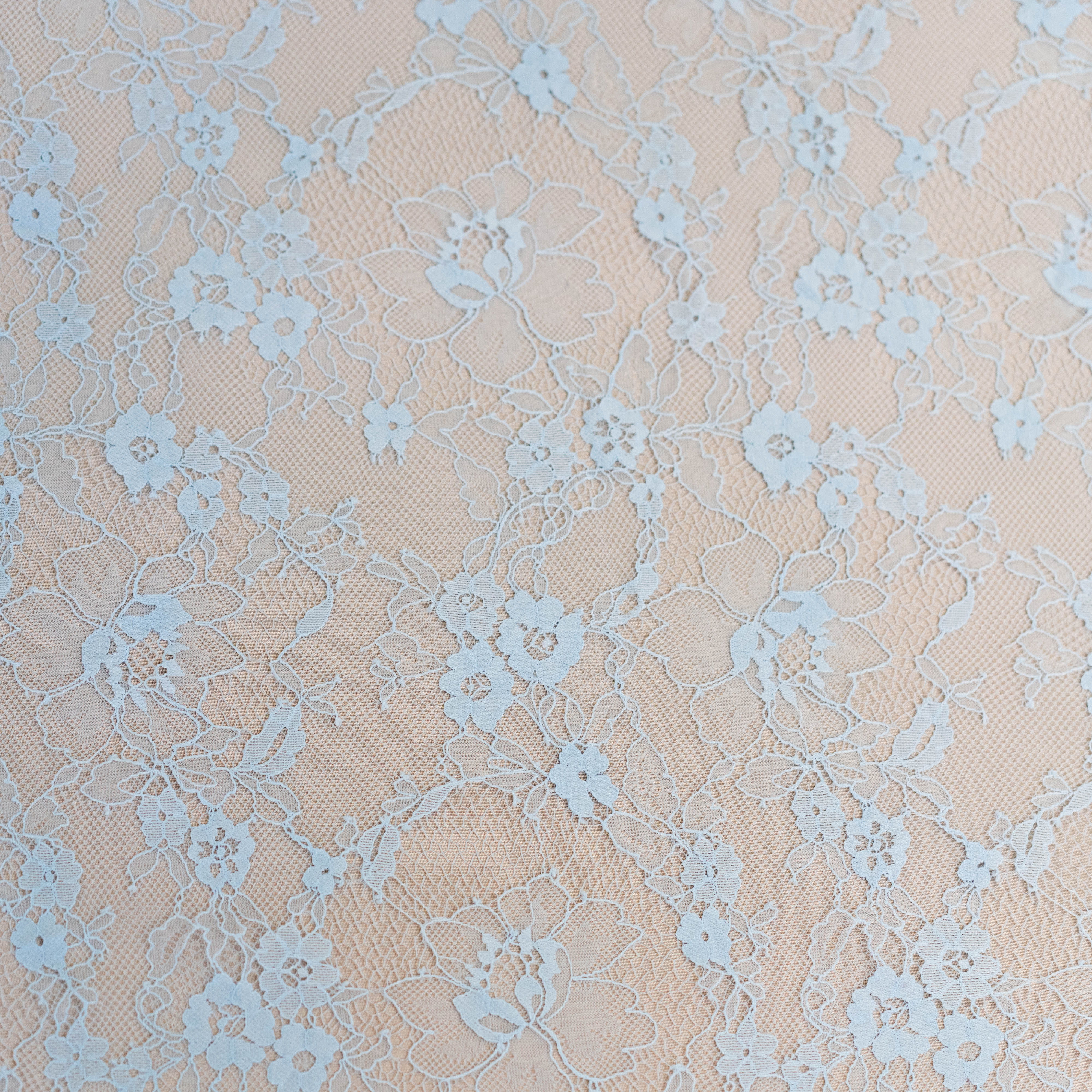 Sky Blue Fine Lace — featuring scalloped edges and floral motifs, in viscose and nylon, 140cm wide