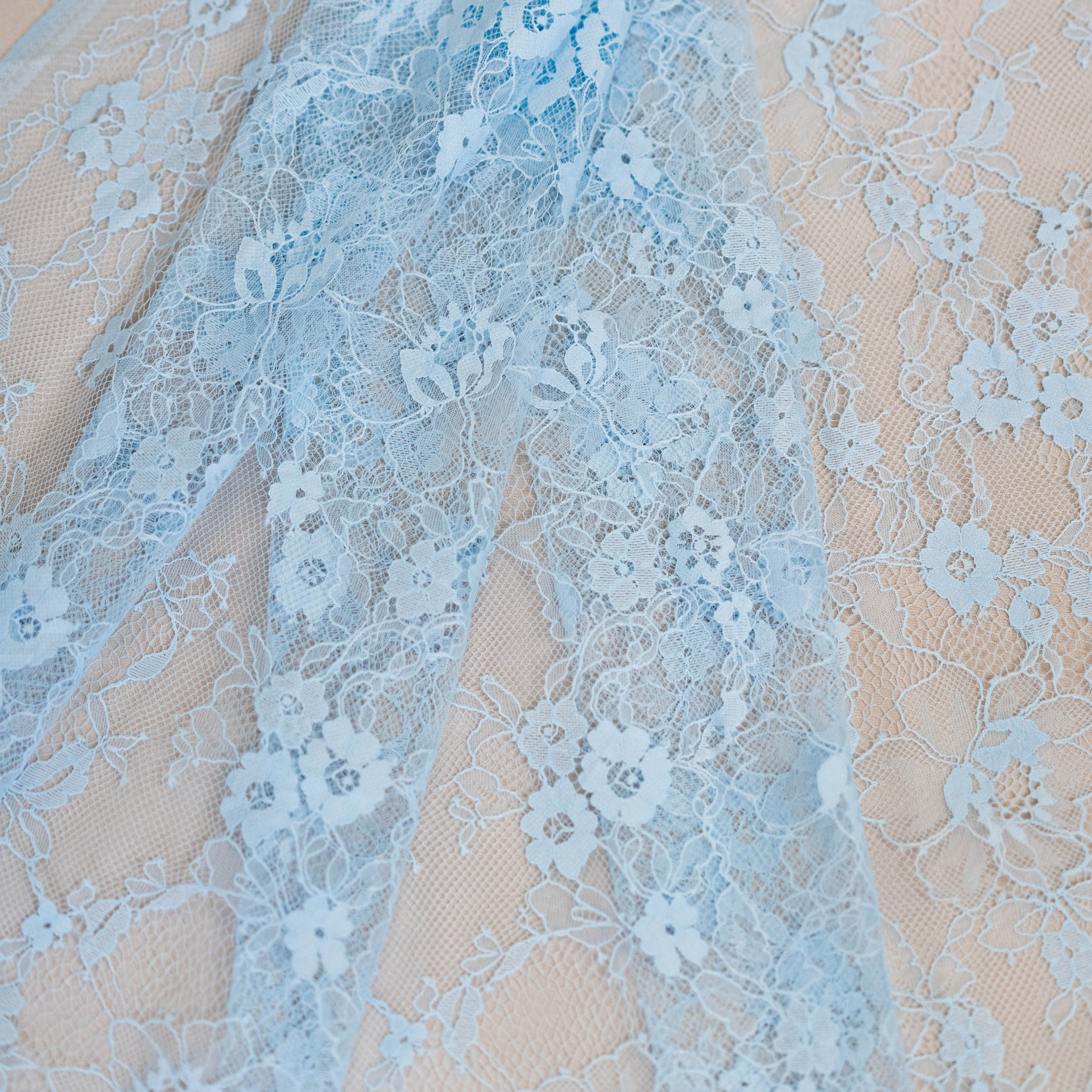 Sky Blue Fine Lace — featuring scalloped edges and floral motifs, in viscose and nylon, 140cm wide