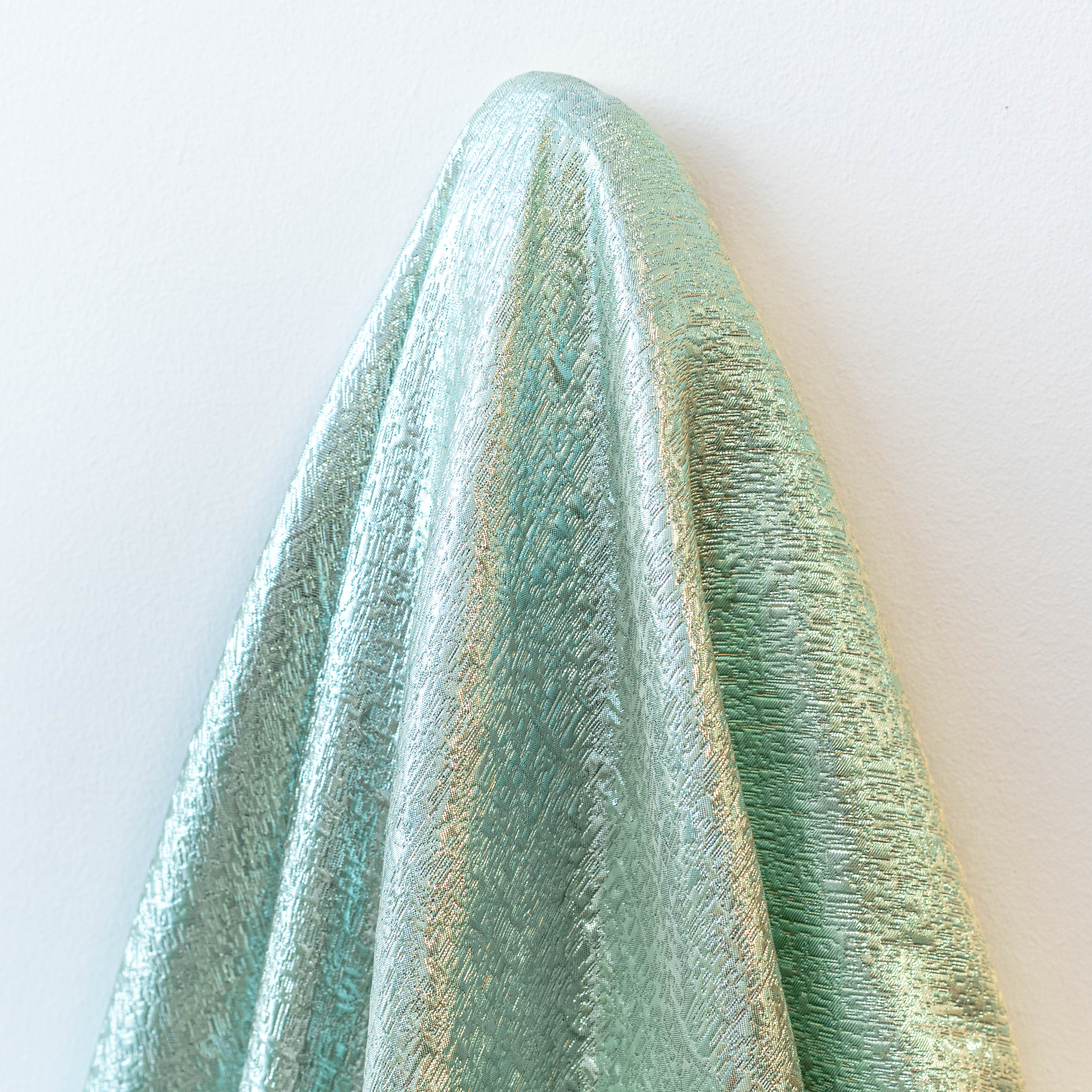 Spearmint Metallic Jacquard — featuring a woven metallic jacquard design with a soft feel and stiff drape, 140cm wide