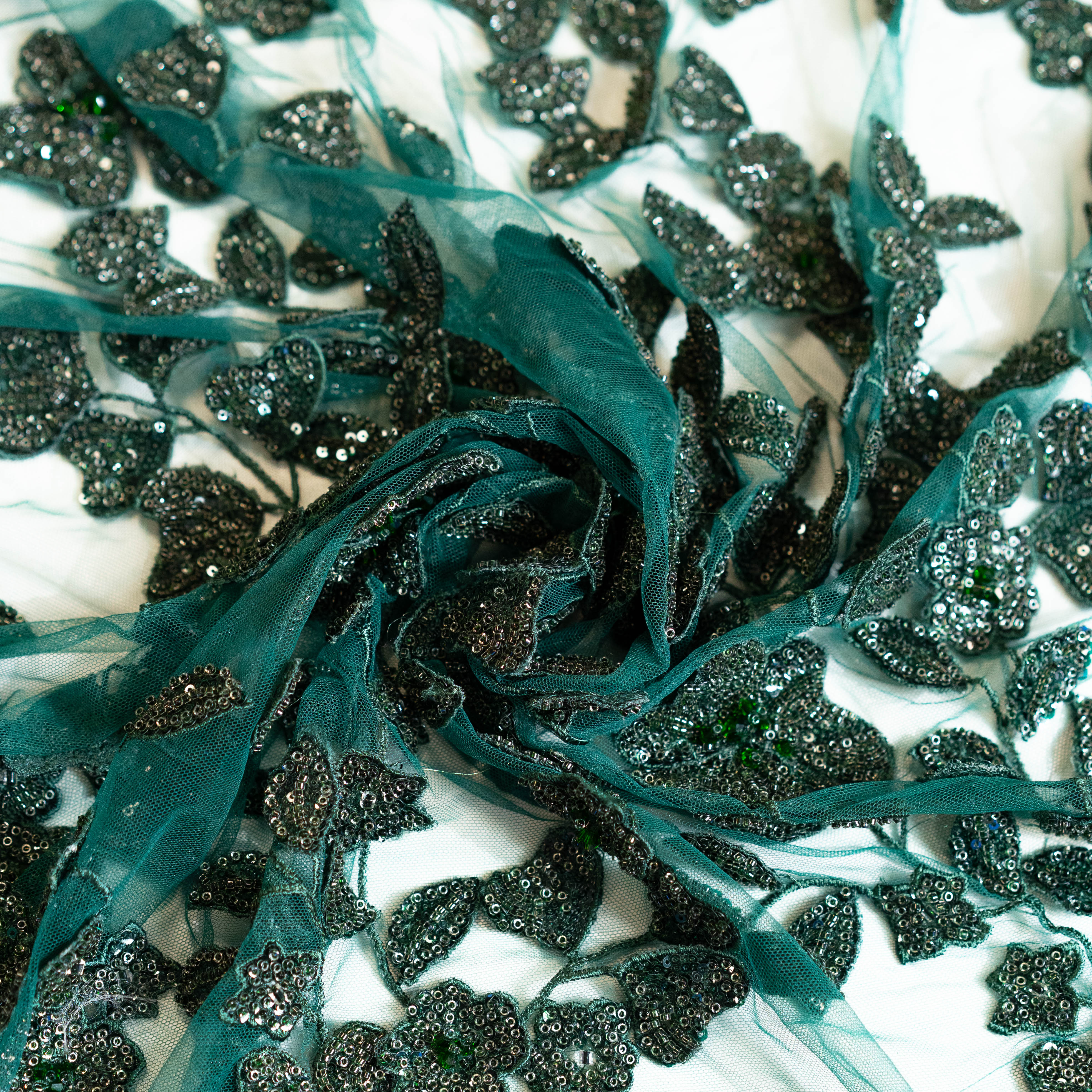 Bottle Green Botanical Beaded Tulle — featuring floral motifs, a 3D floral design and hand-beading, 50% nylon 50% polyester, 130cm wide