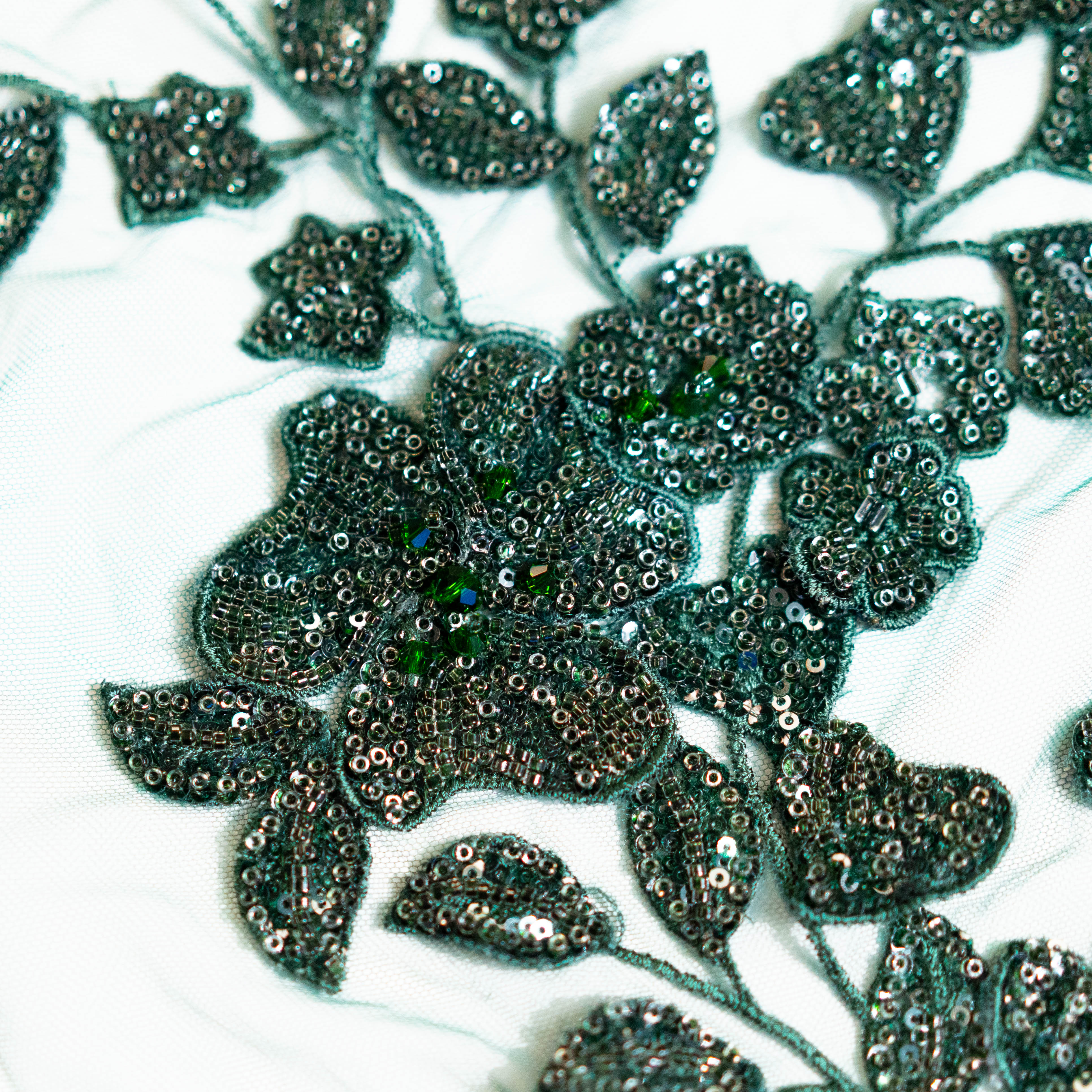 Bottle Green Botanical Beaded Tulle — featuring floral motifs, a 3D floral design and hand-beading, 50% nylon 50% polyester, 130cm wide