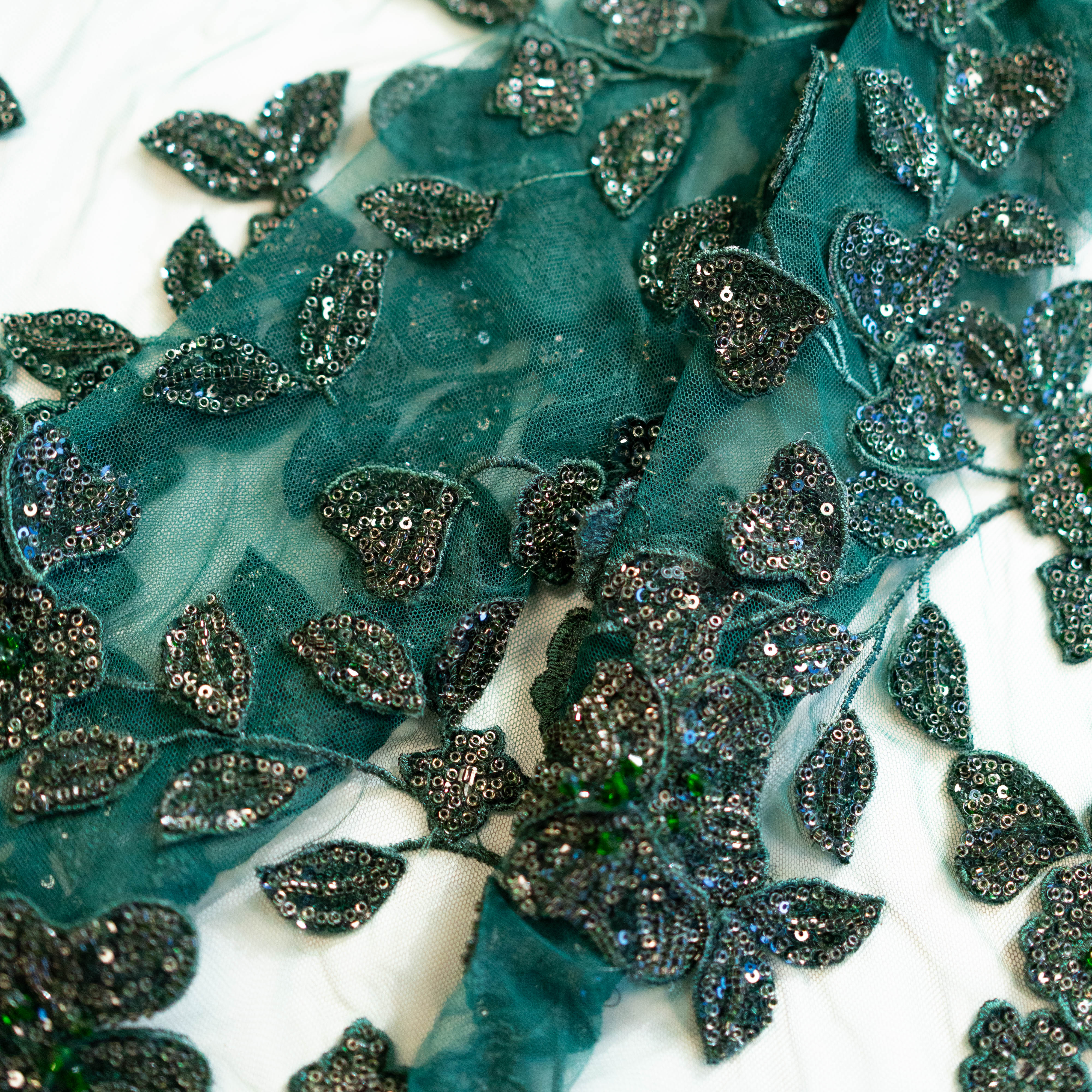 Bottle Green Botanical Beaded Tulle — featuring floral motifs, a 3D floral design and hand-beading, 50% nylon 50% polyester, 130cm wide