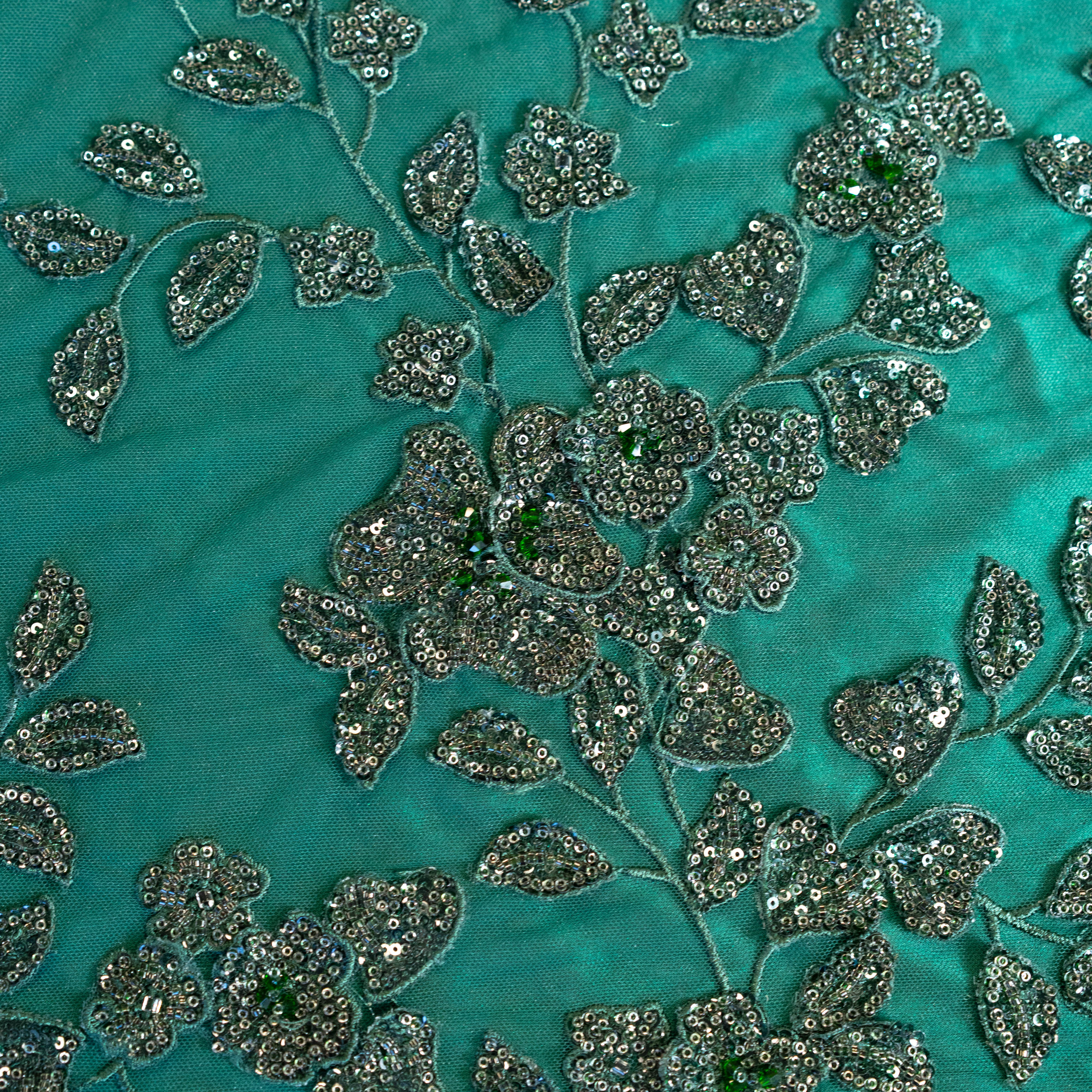 Bottle Green Botanical Beaded Tulle — featuring floral motifs, a 3D floral design and hand-beading, 50% nylon 50% polyester, 130cm wide