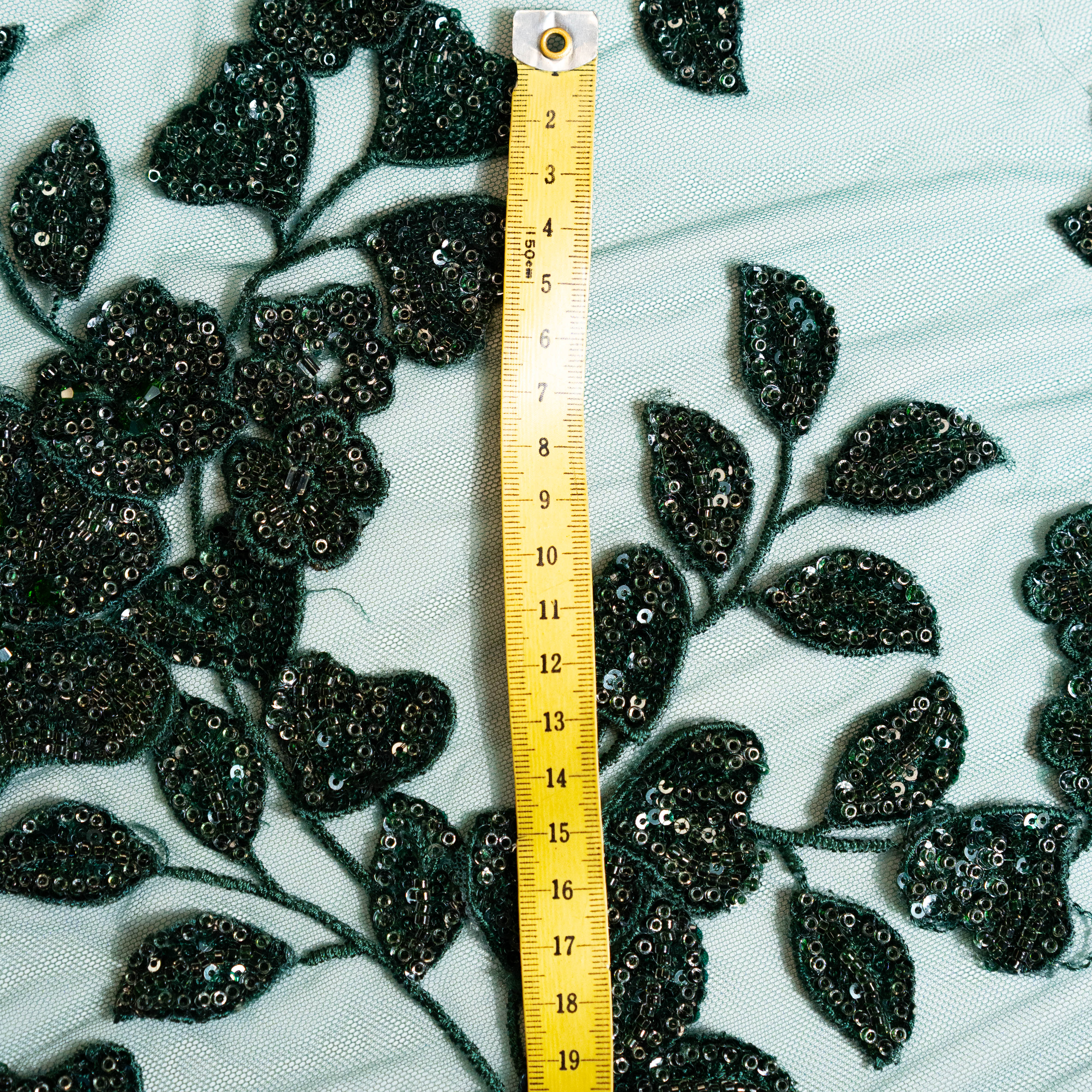 Bottle Green Botanical Beaded Tulle — featuring floral motifs, a 3D floral design and hand-beading, 50% nylon 50% polyester, 130cm wide